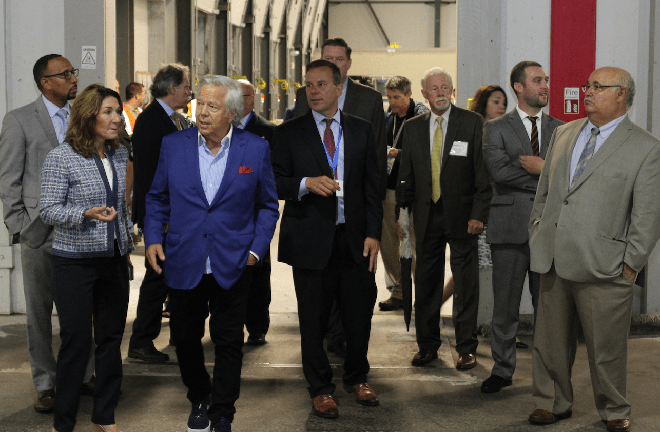 Robert Kraft with Group of People