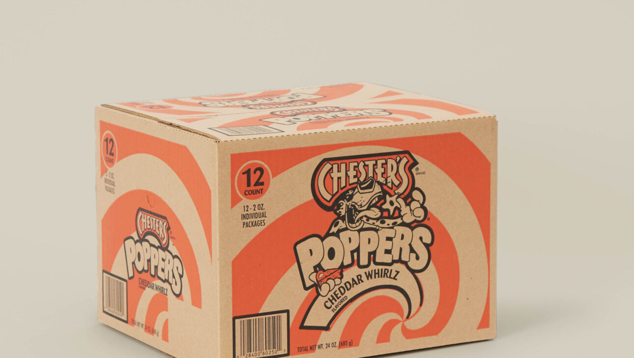 A box of cheetos poppers on a white background.