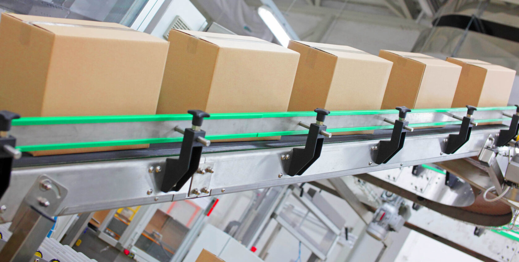 A conveyor belt with boxes on it.
