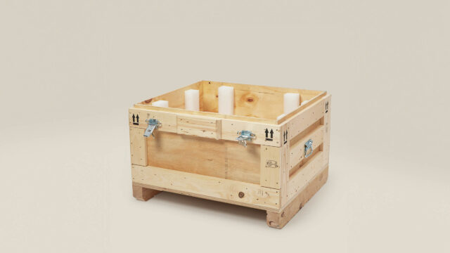 A wooden crate sitting on a white surface.