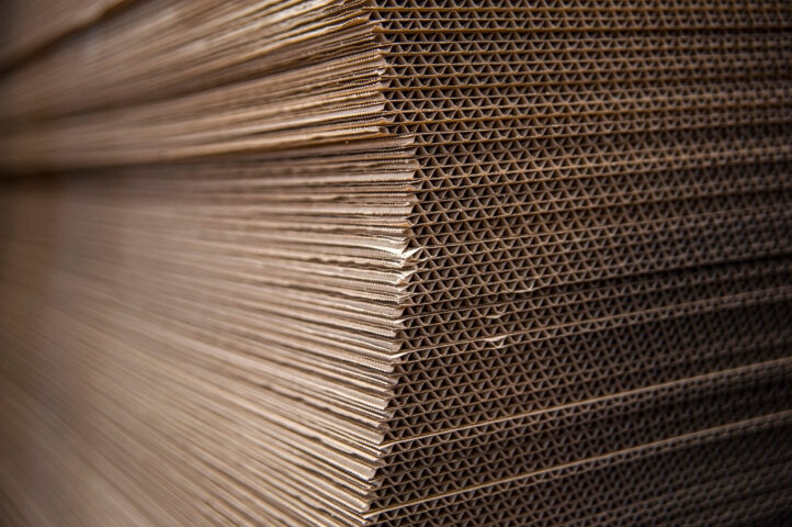 A stack of cardboard boxes in a warehouse.