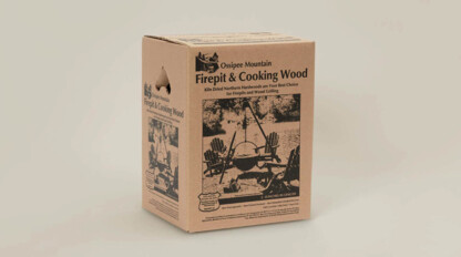 A box with a picture of a firewood and cooking wood.